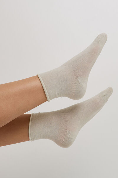 PAIRE DE CHAUSSETTES A PAILLETTES PEAU