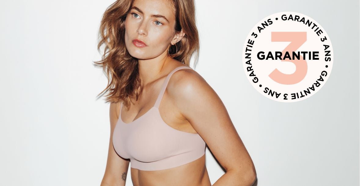 Soutien-gorge noir adapté pour être sous les vêtements. Garantie 3 ans.